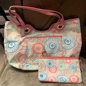 Gently used nylon Coach bag with matching wristlet.